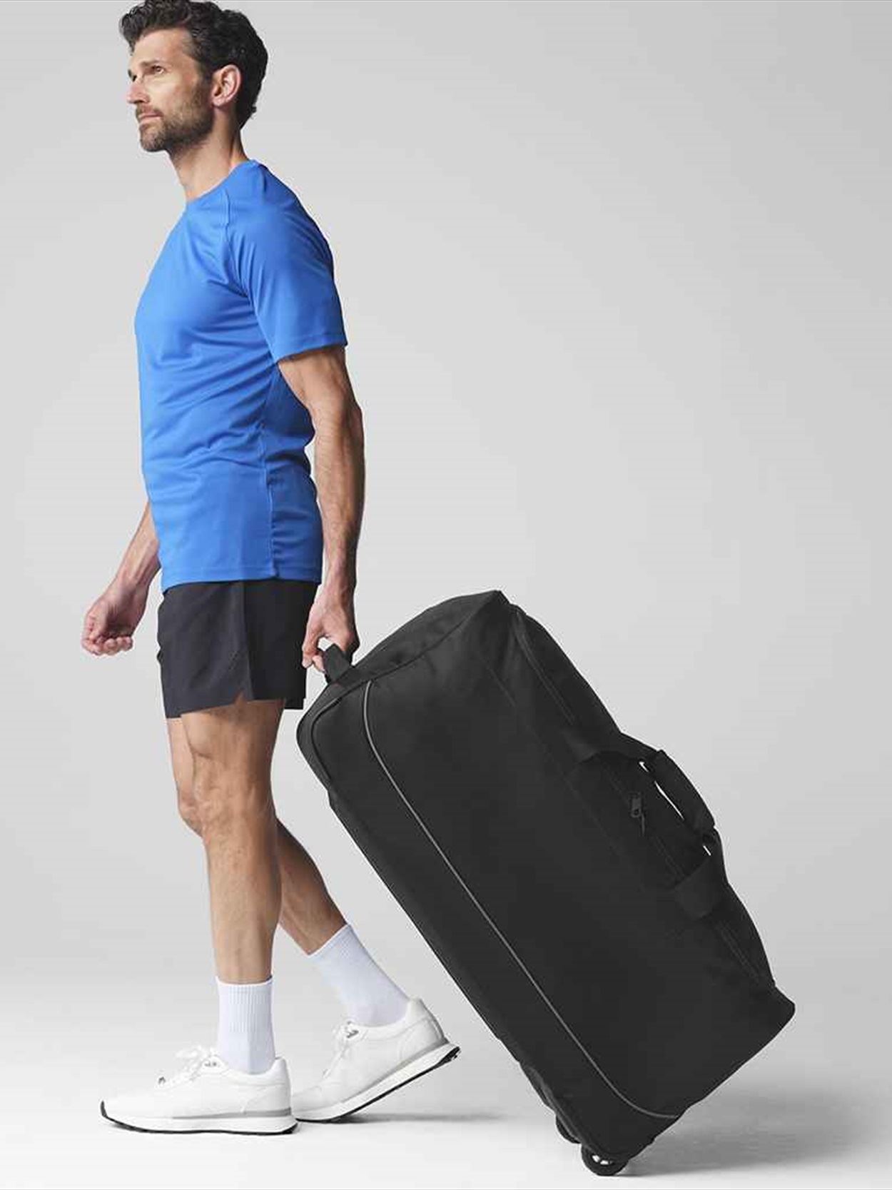 QS87 Quadra Teamwear Wheeled Holdall Image 1